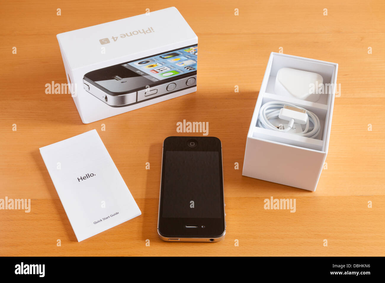 New iPhone 4s unpacked, with box and contents, UK Stock Photo