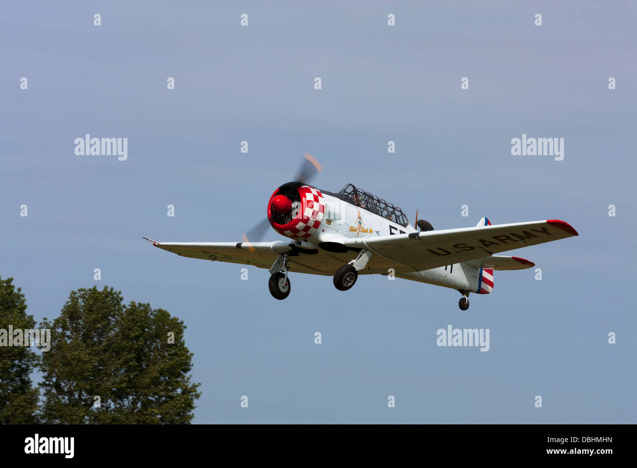 North American AT-6D Harvard III EP-H D 42-84555 G-ELMH taking-off from Breighton Airfield Stock Photo