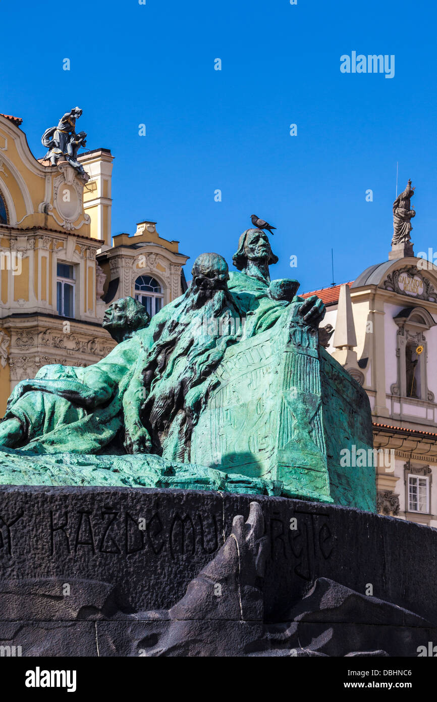 A pigeon sits atop the Jan Hus Memorial in the Old Town Square, Prague. Stock Photo