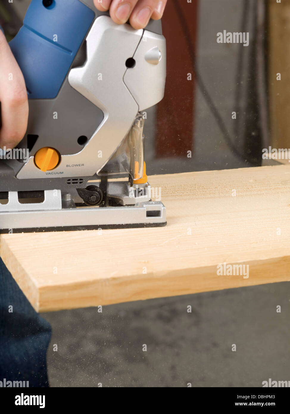 cutting a wood using jigsaw cutter Stock Photo Alamy