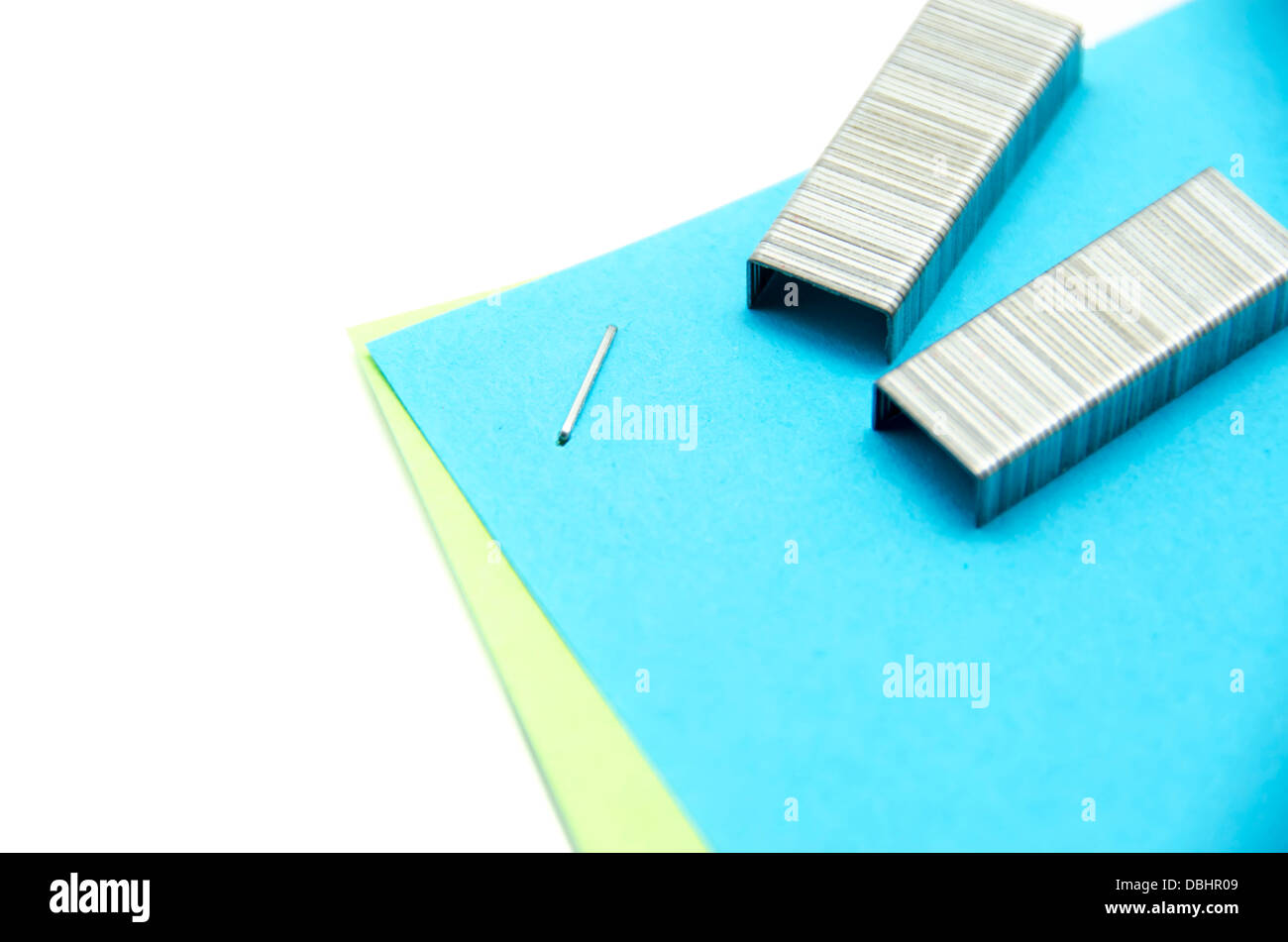 Stapled paper with staples Stock Photo Alamy