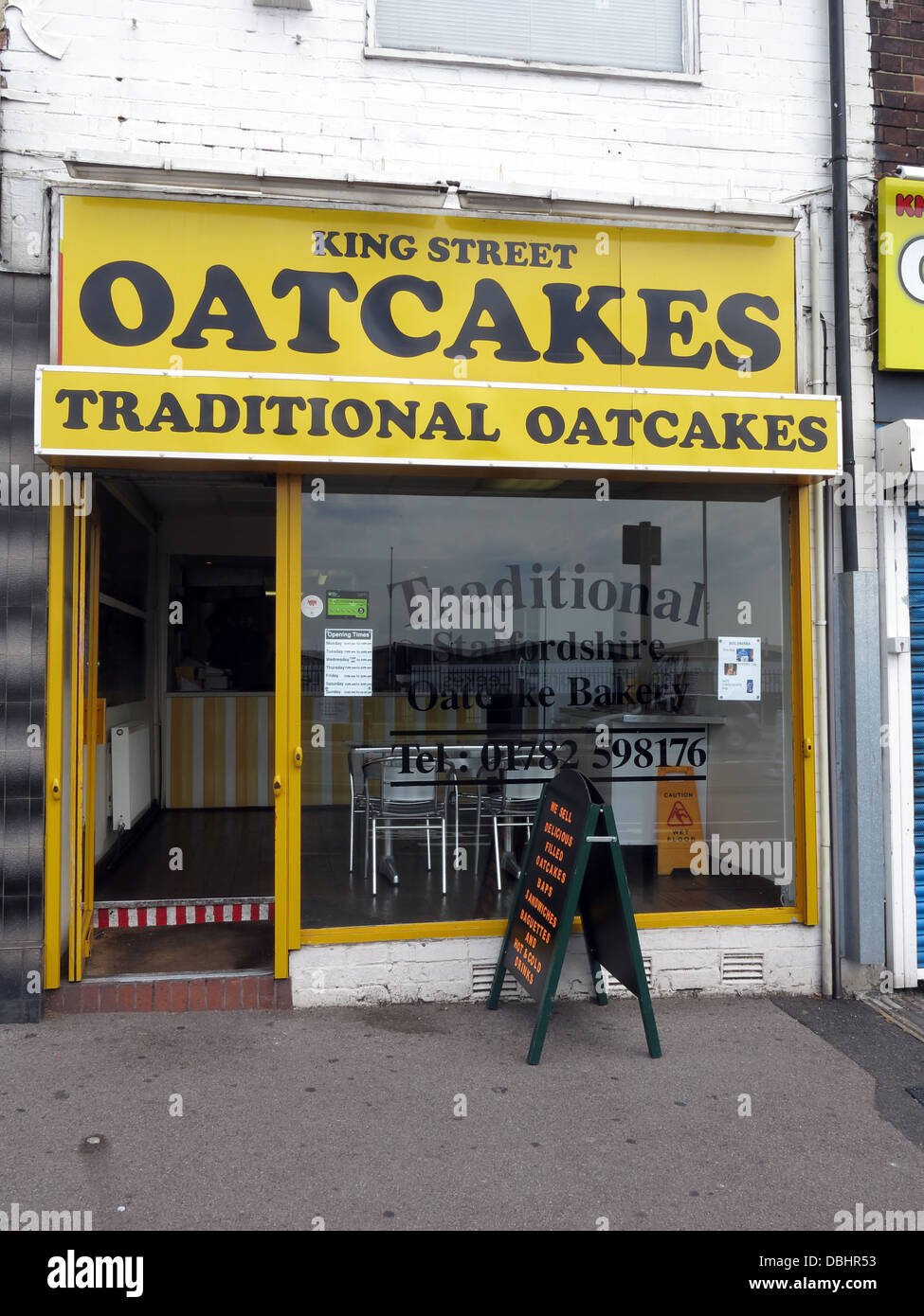 Exterior of a traditional Stoke / Staffordshire Oatcake shop, with bright yellow frontage. Stock Photo
