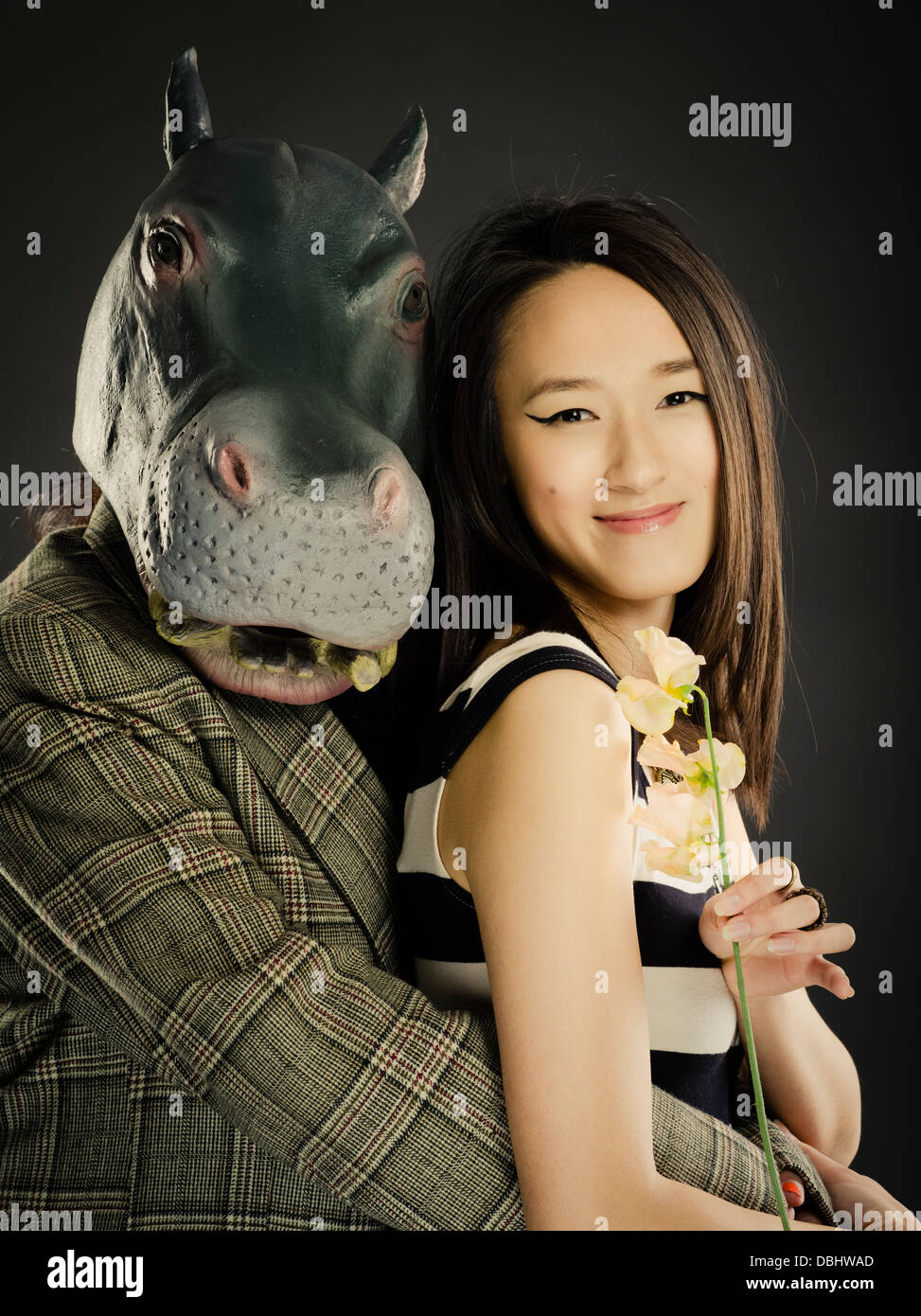 Hippo And Beautiful Asian Woman With Long Dark Hair Pose For Stock