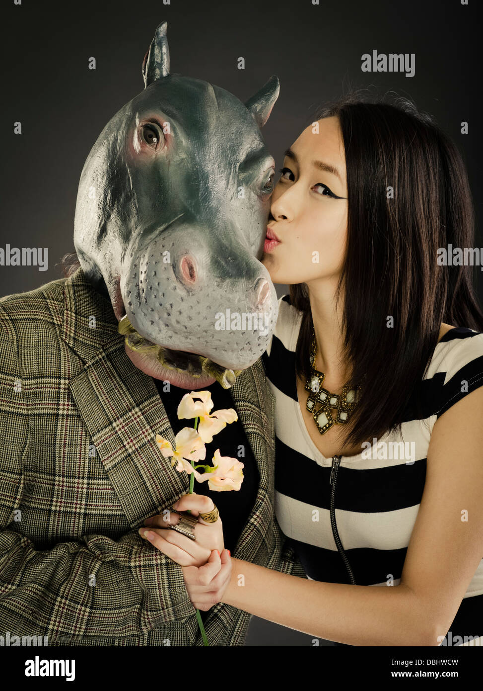 Hippo And Beautiful Asian Woman With Long Dark Hair Pose For Stock