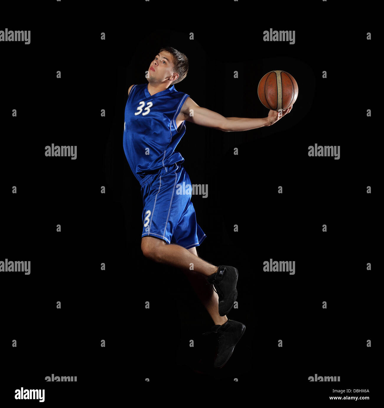 Basketball player with a ball Stock Photo Alamy