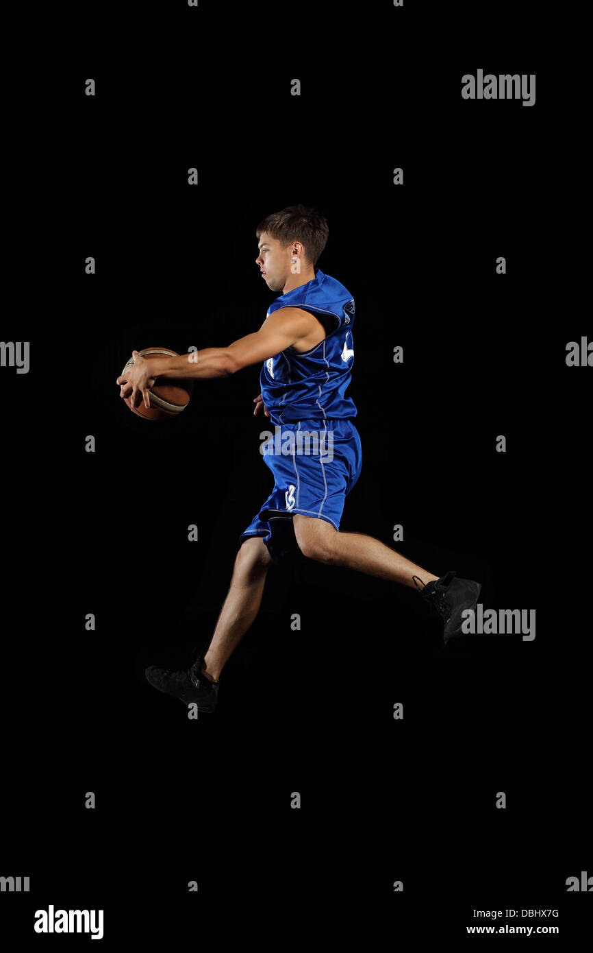 Basketball player with a ball Stock Photo Alamy