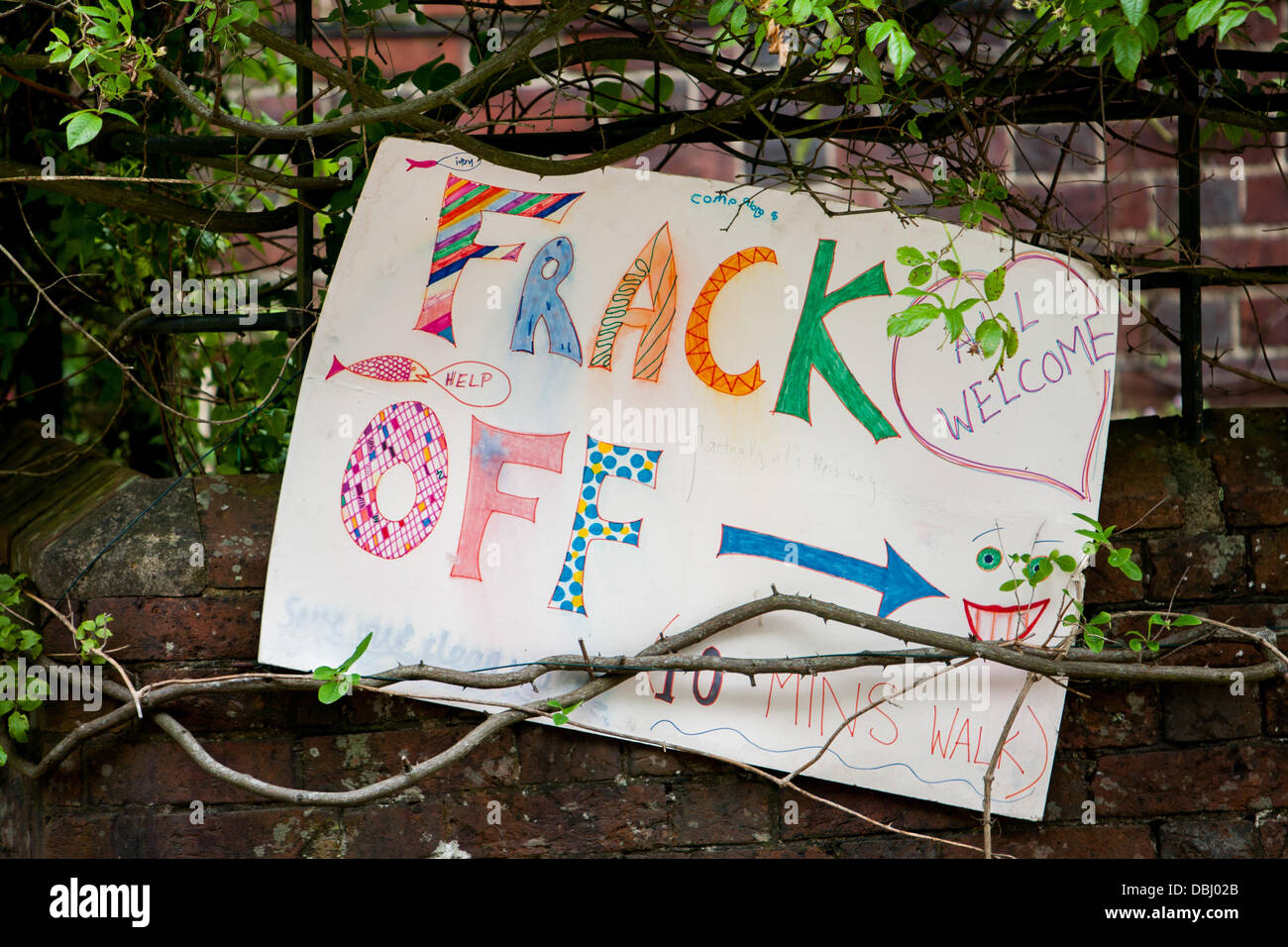 Balcombe, West Sussex, UK. 31st July, 2013. Frack off sign outside Balcombe station with arrow pointing to protest against Cuadrilla drilling & fracking. Balcombe, West Sussex, UK. Credit:  martyn wheatley/Alamy Live News Stock Photo