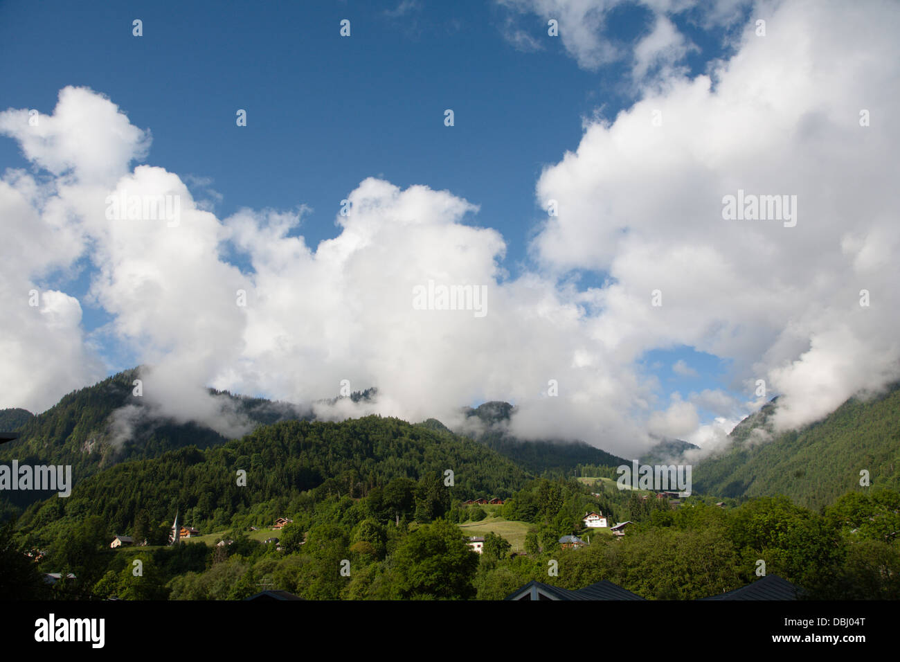 Low clouds covers the mountians above St. Jean D'Aulp in the French Alps Stock Photo