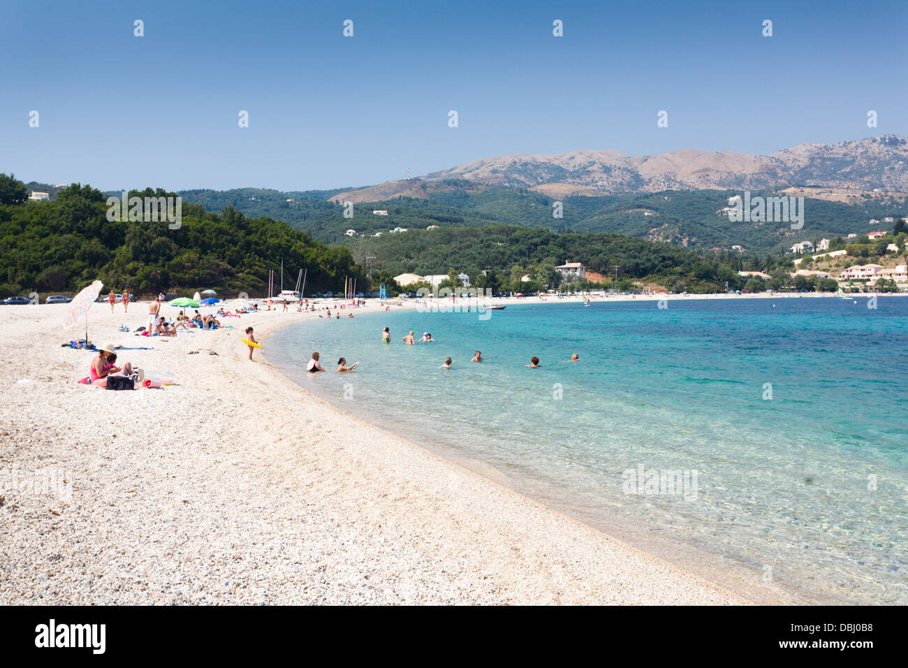 Holiday makers on the beach at Avlaki Corfu Stock Photo