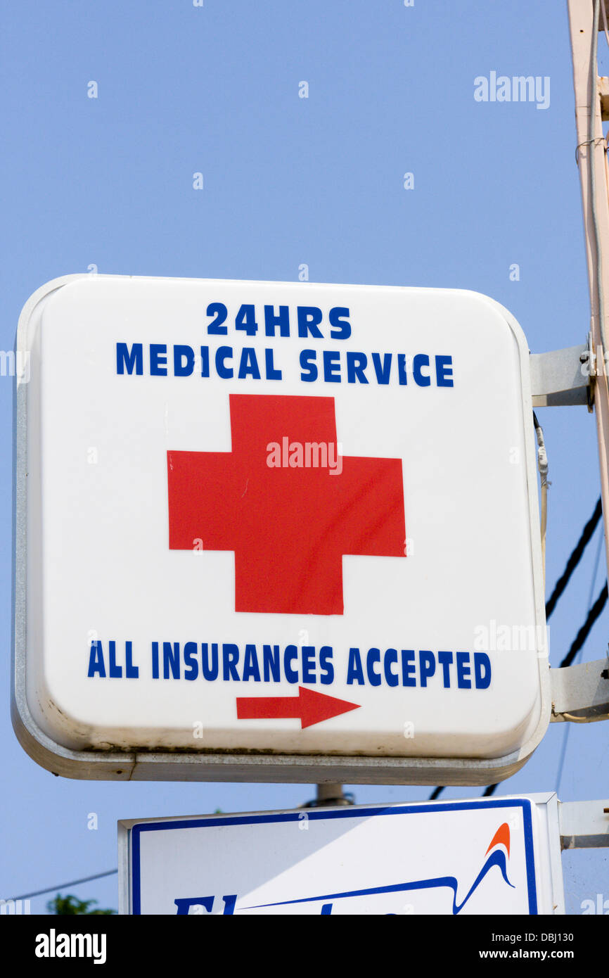 24 hour medical service sign all insurance accepted Stock Photo