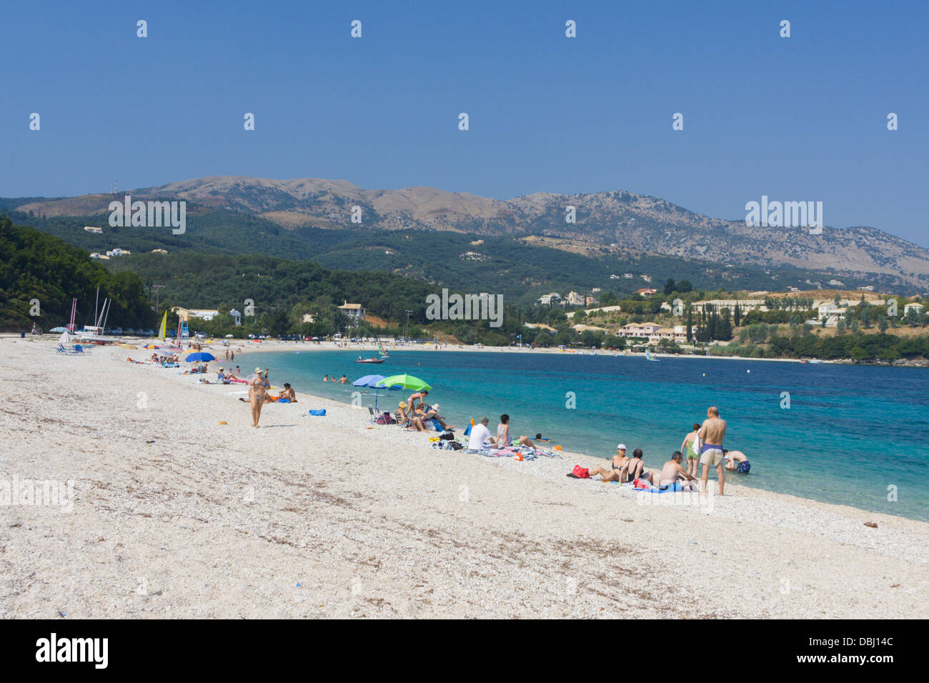 families on Avlaki beach North West Corfu Stock Photo