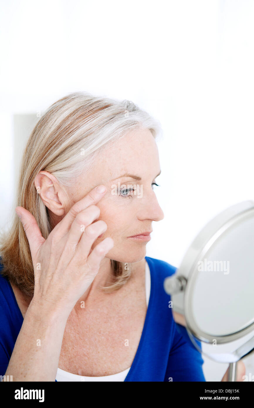 ELDERLY PERSON WITH MIRROR Stock Photo Alamy