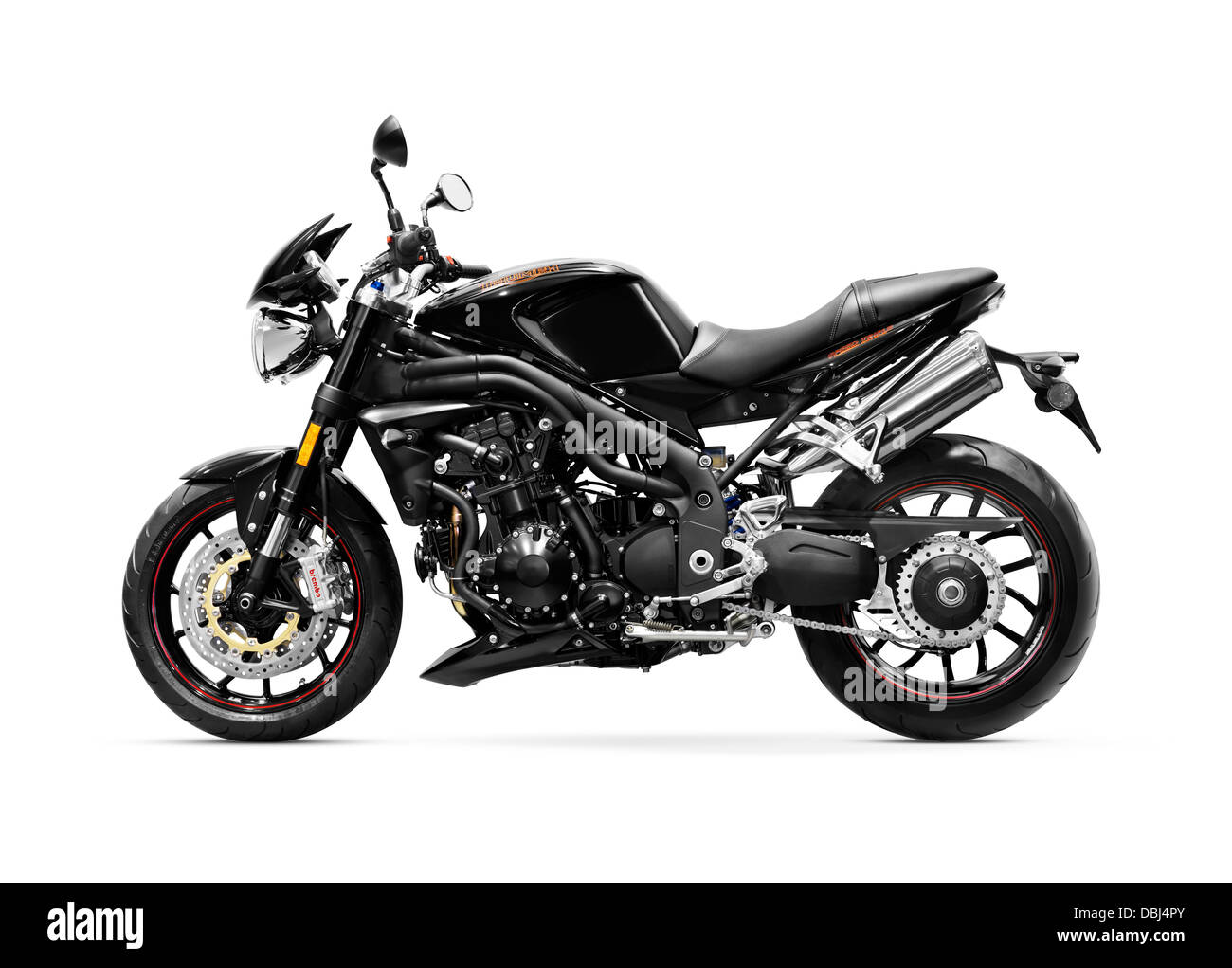 License available at MaximImages.com - Black 2010 Triumph Speed Triple sport bike motorcycle 15th anniversary special edition isolated on white backgr Stock Photo