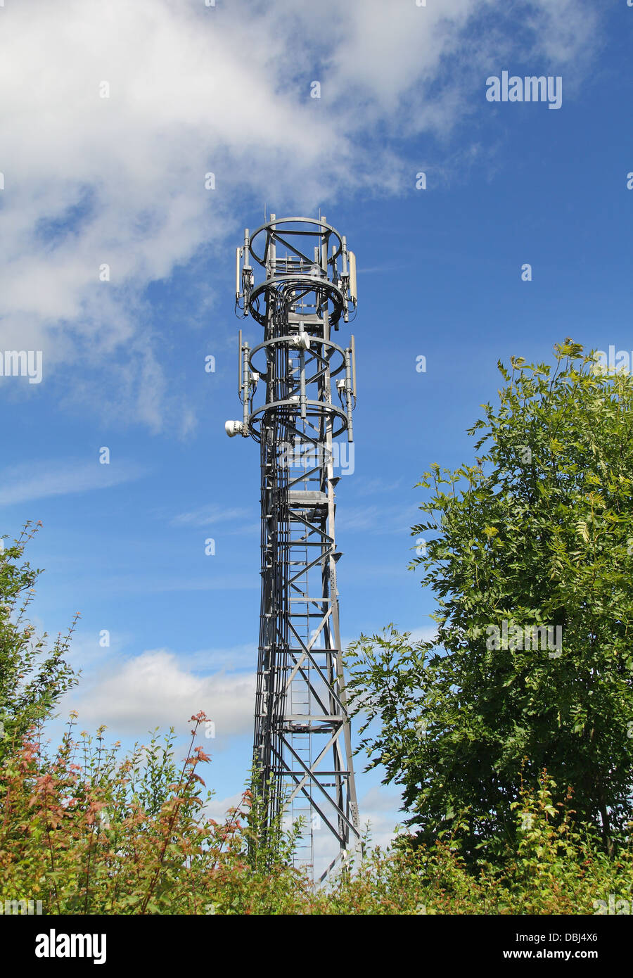 Radio Mast against a blue sky Stock Photo