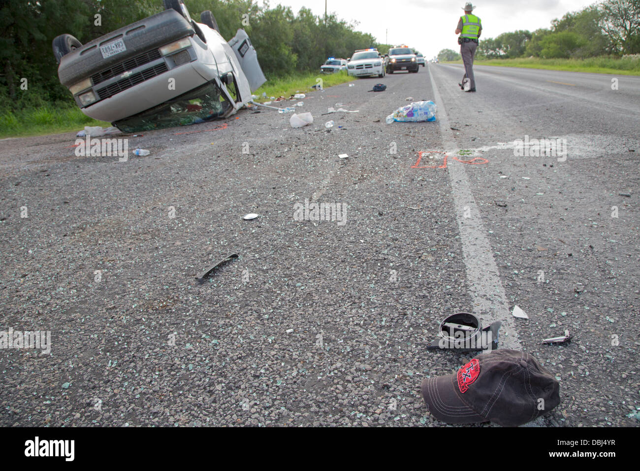 Falfurrias, Texas - An van holding 26 undocumented immigrants from Central America overturned on Texas Highway 285. Stock Photo