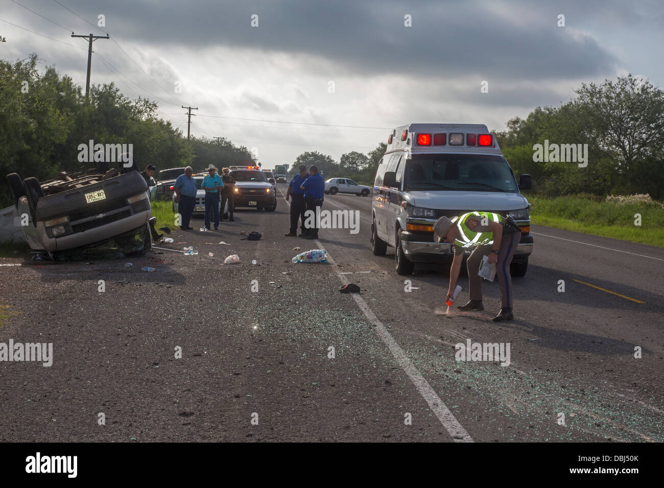Falfurrias, Texas - An van holding 26 undocumented immigrants from Central America overturned on Texas Highway 285. Stock Photo