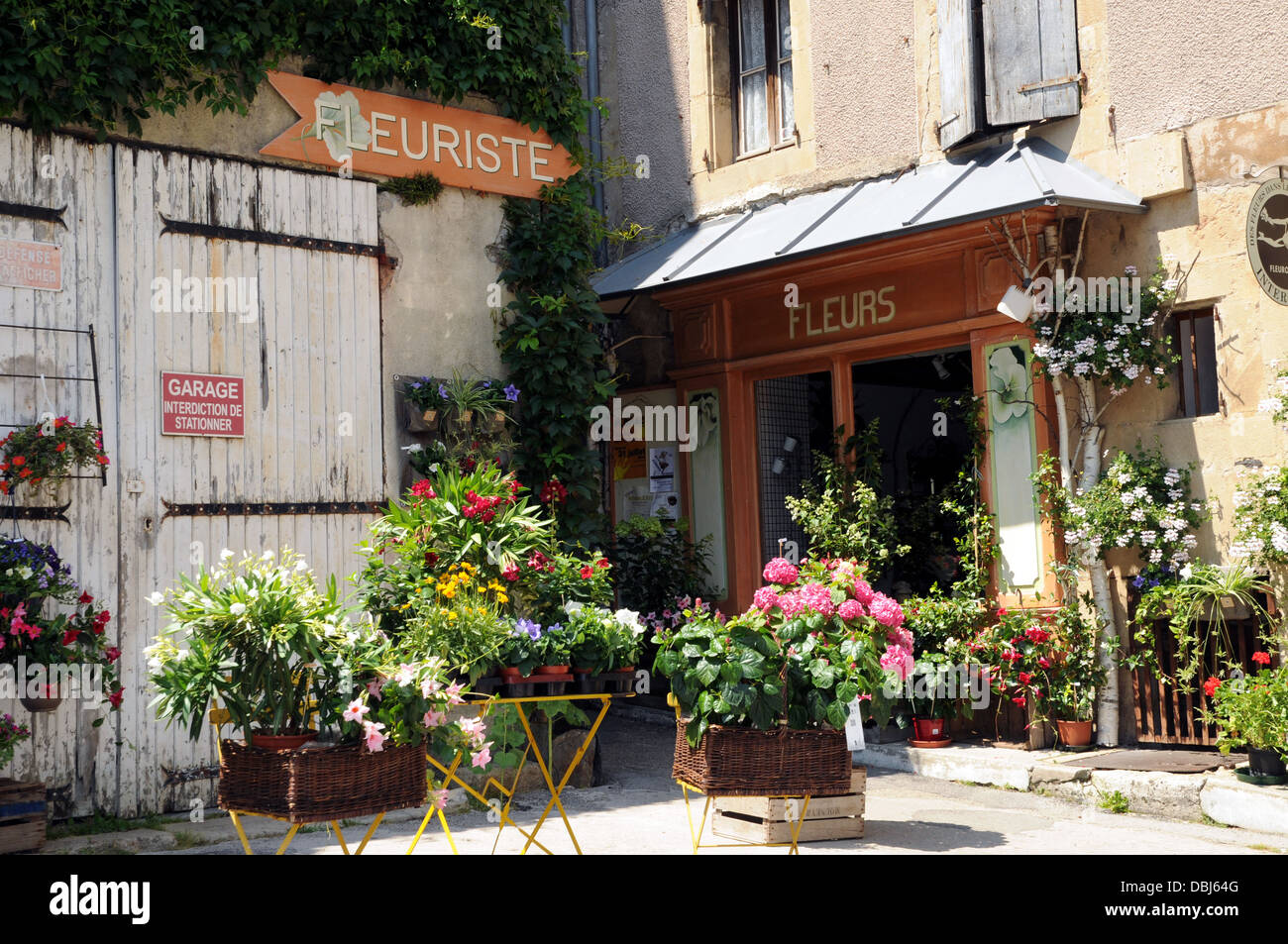 A traditional florist's shop in the French town of Florac. The town is a popular tourist destination. Stock Photo