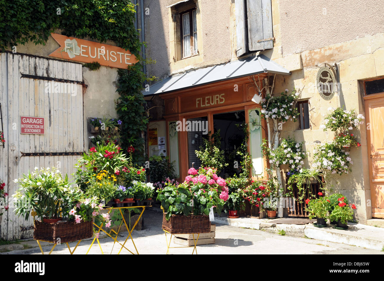 A traditional florist's shop in the French town of Florac. The town is a popular tourist destination. Stock Photo