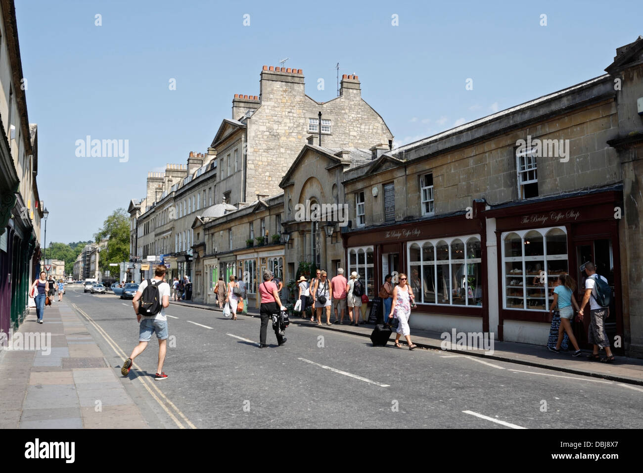Shops and people on Pulteney Bridge in Bath England UK Stock Photo