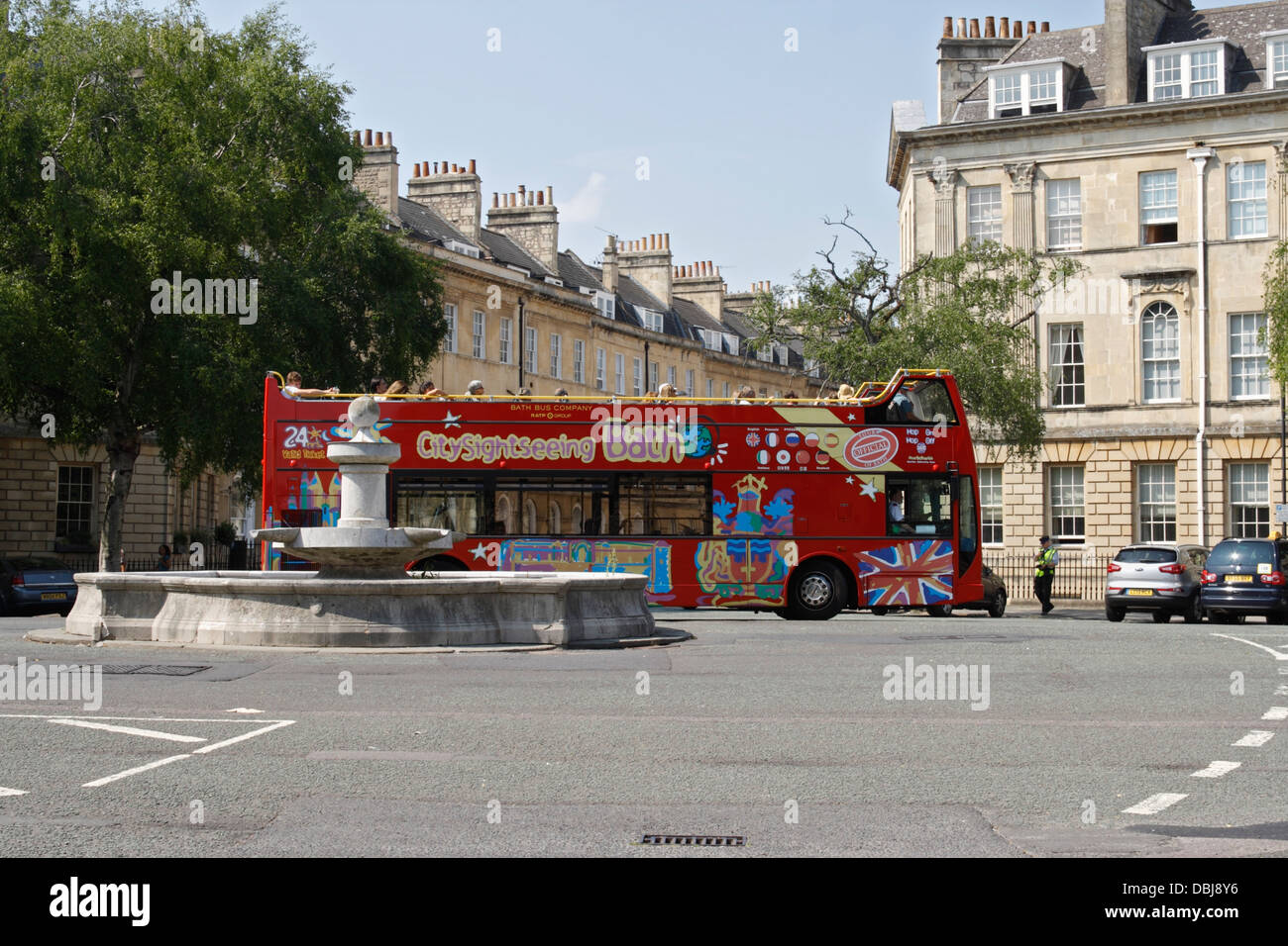 Open top city sightseeing tour bus in Bath Pulteney Street England UK Stock Photo