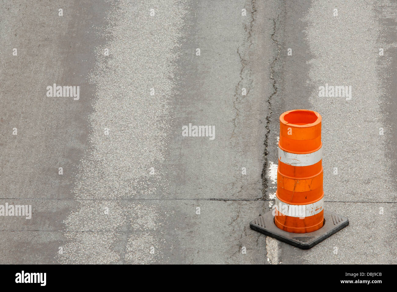 Single highway pylon and asphalt Stock Photo