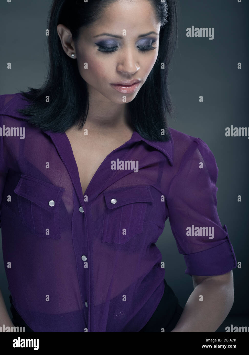 Philippine American young woman purple shirt Stock Photo