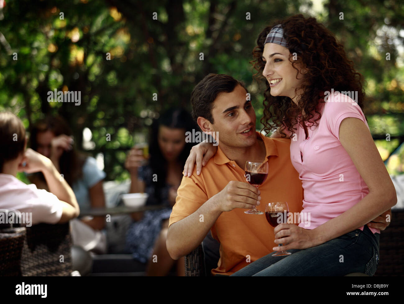 Woman sitting on man lap hi-res stock photography and images - Alamy