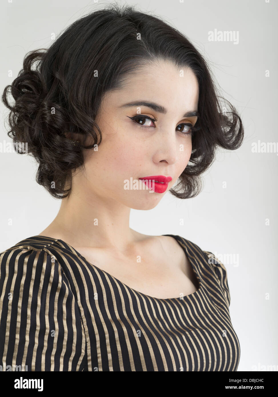 Studio portrait of young beautiful Japanese woman Stock Photo - Alamy