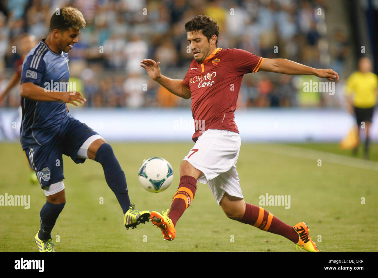 Kansas City, KS, USA. 31st July, 2013. July 31, 2013: Mehdi Benatia #17 of the AS Roma defends against Patrice Bernier #10 of the MLS All-Stars in the first half during the MLS All-Star game between AS Roma and the MLS All-Stars at Livestrong Stadium in Kansas City KS Credit:  csm/Alamy Live News Stock Photo