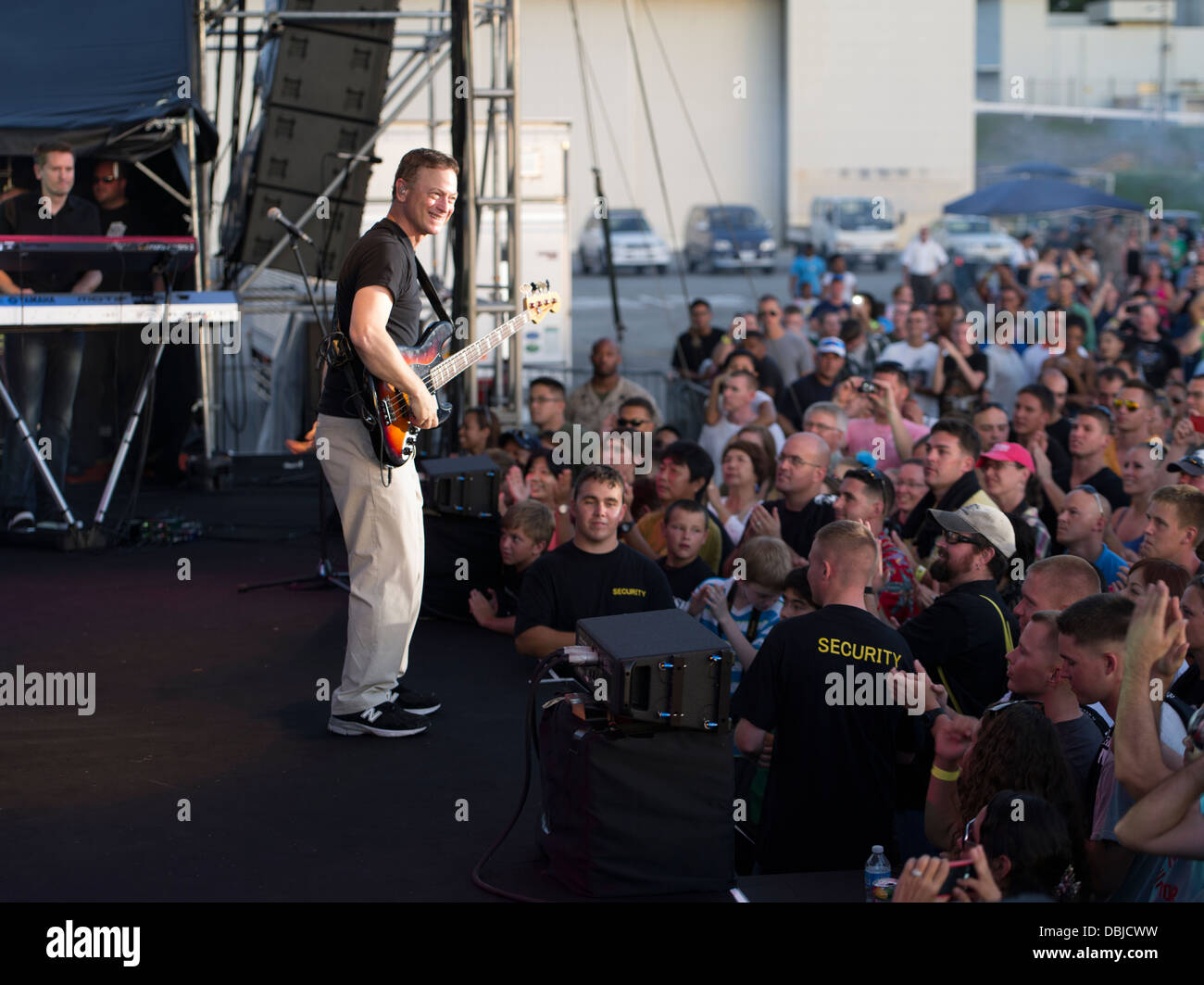 Gary Sinise and the Lt. Dan Band perfom for the US troops on Marine Corps Air Station Futenma in Okinawa. Organized by the USO. Stock Photo
