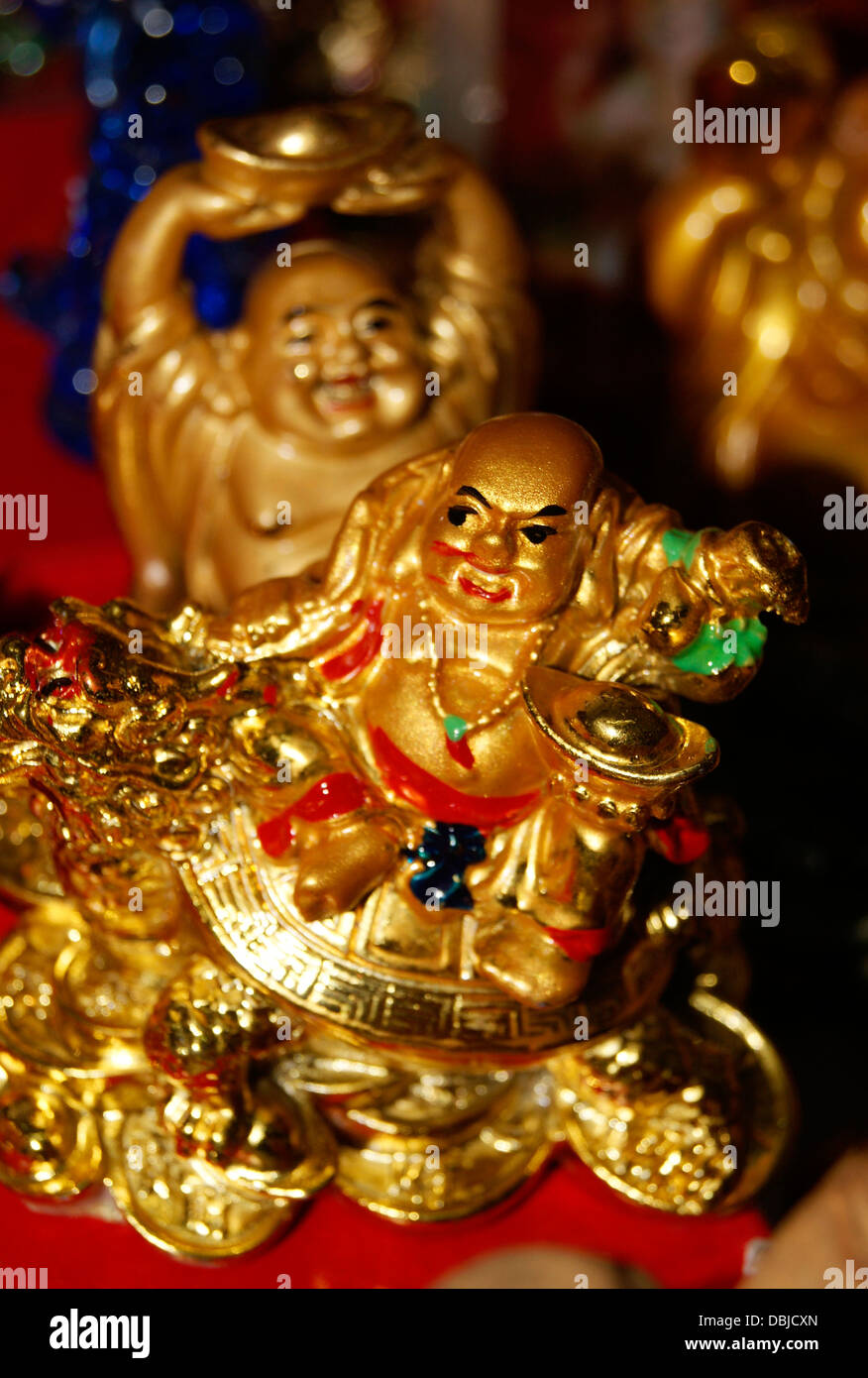 Chinese Feng Shui Laughing Buddha. Happy Golden Buddha Statue Believed to  carry Good luck Stock Photo - Alamy