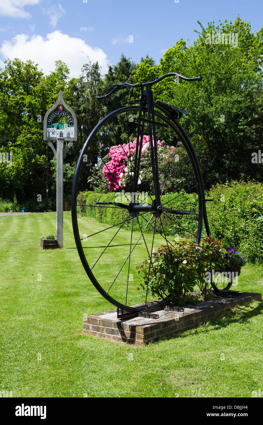Sissinghurst village sign and penny farthing Stock Photo