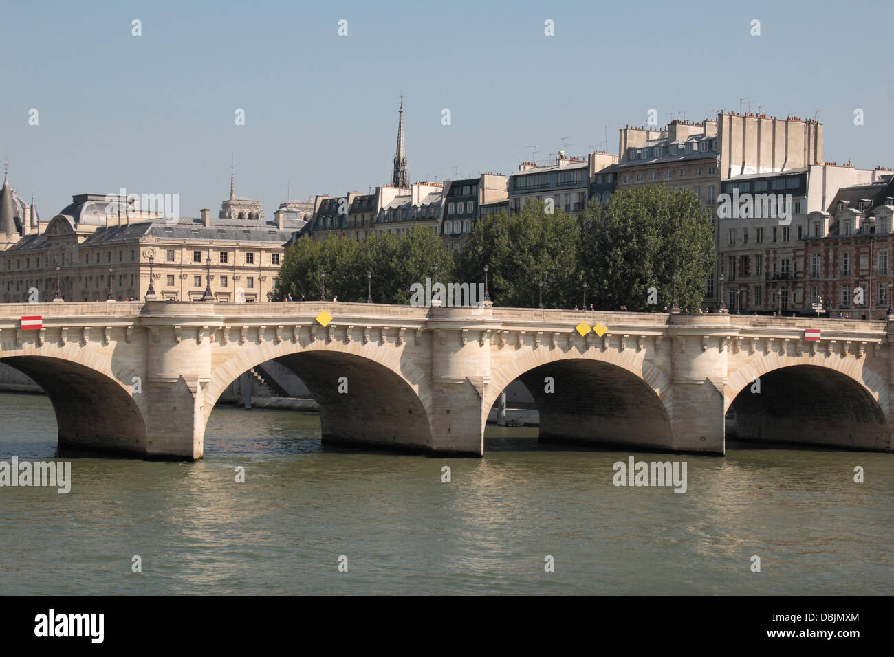 The Pont Nerf stone (northern section) arched bridge showing CEVNI signs on its arches, River Seine, Paris, France. Stock Photo