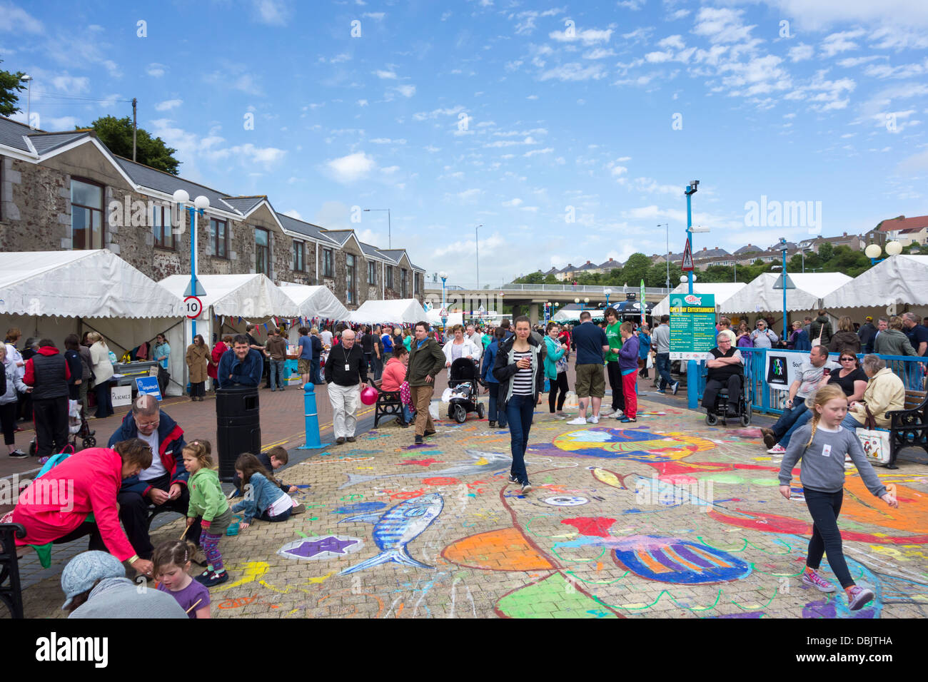 Stalls and visitors at the annual Pembrokeshire Fish Week festival at Milford Haven, Pembrokeshire. Stock Photo