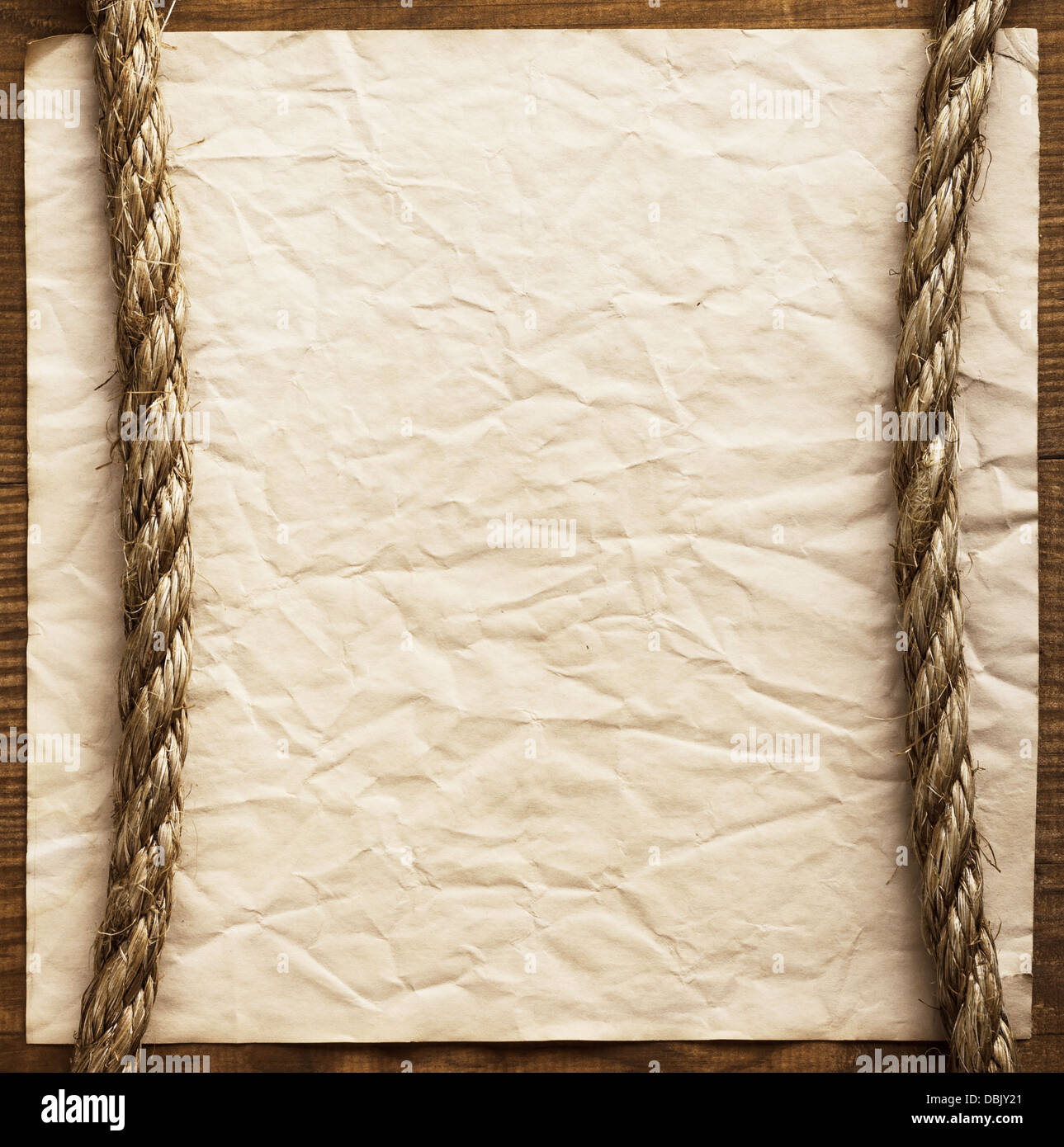 aged Rope on the old paper background Stock Photo - Alamy