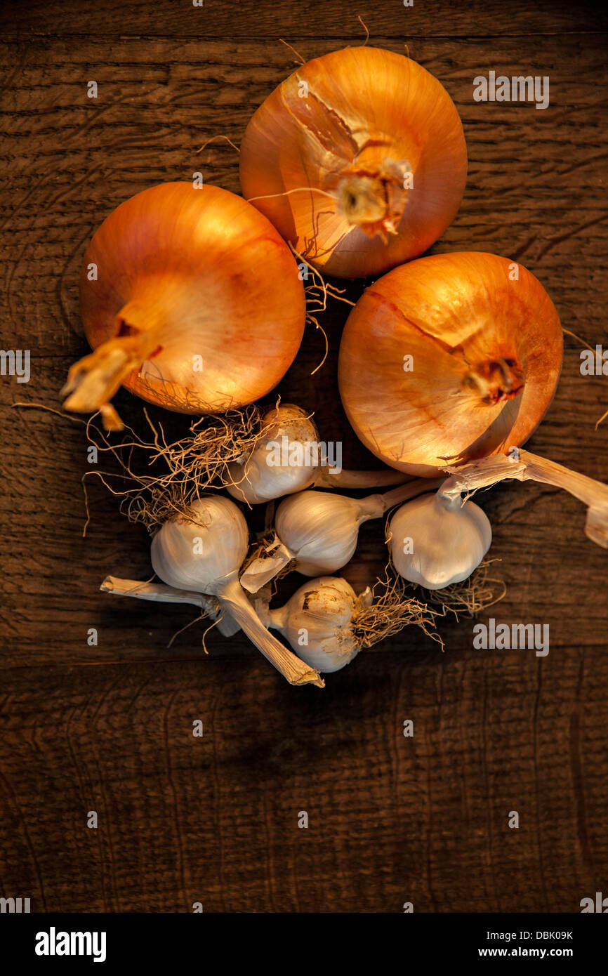 Fresh Garlic And Onions On Wooden Table, Croatia, Slavonia, Europe Stock Photo