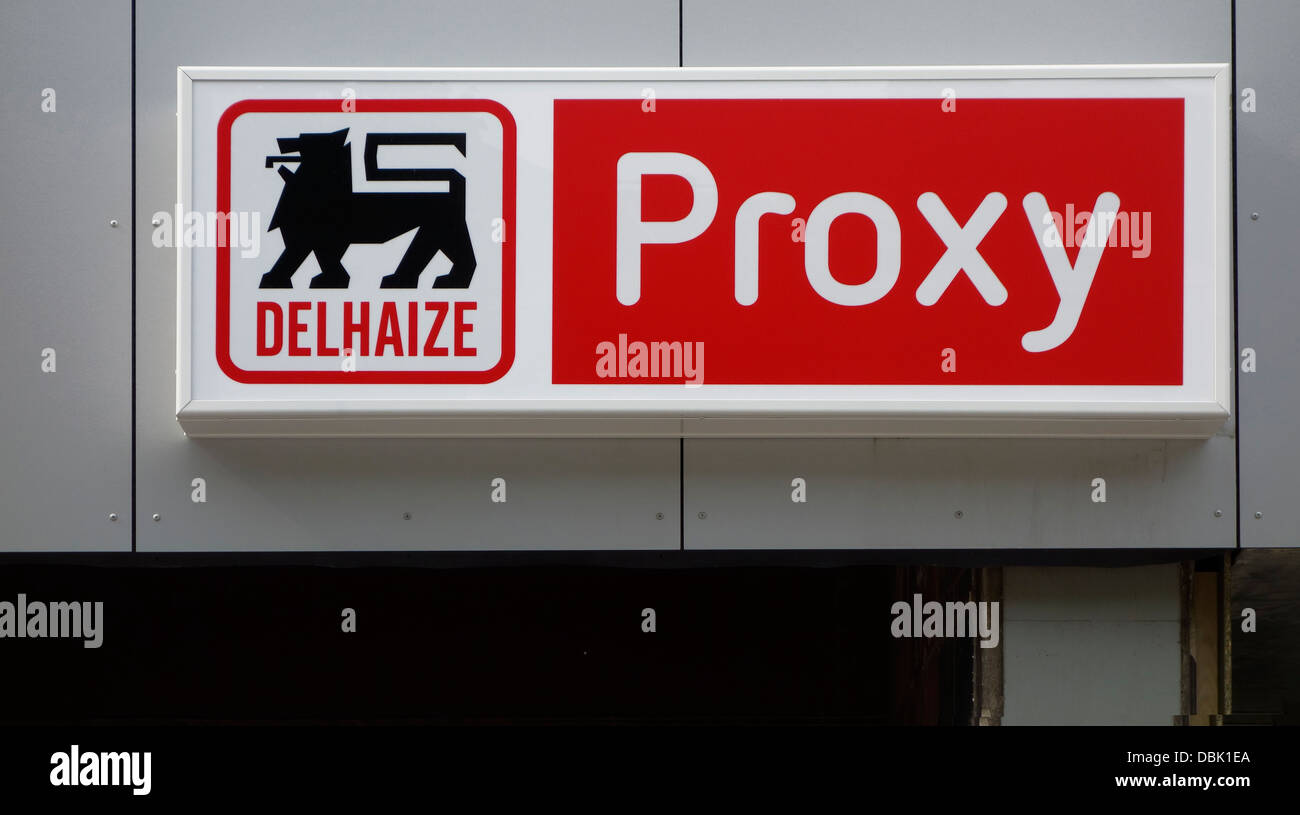 Sign showing logo of the supermarket Delhaize Proxy Stock Photo