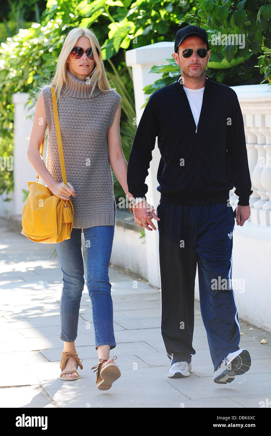 Claudia Schiffer and her husband Matthew Vaughn hold hands after dropping  their children at school London, England - 01.07.11 Stock Photo - Alamy