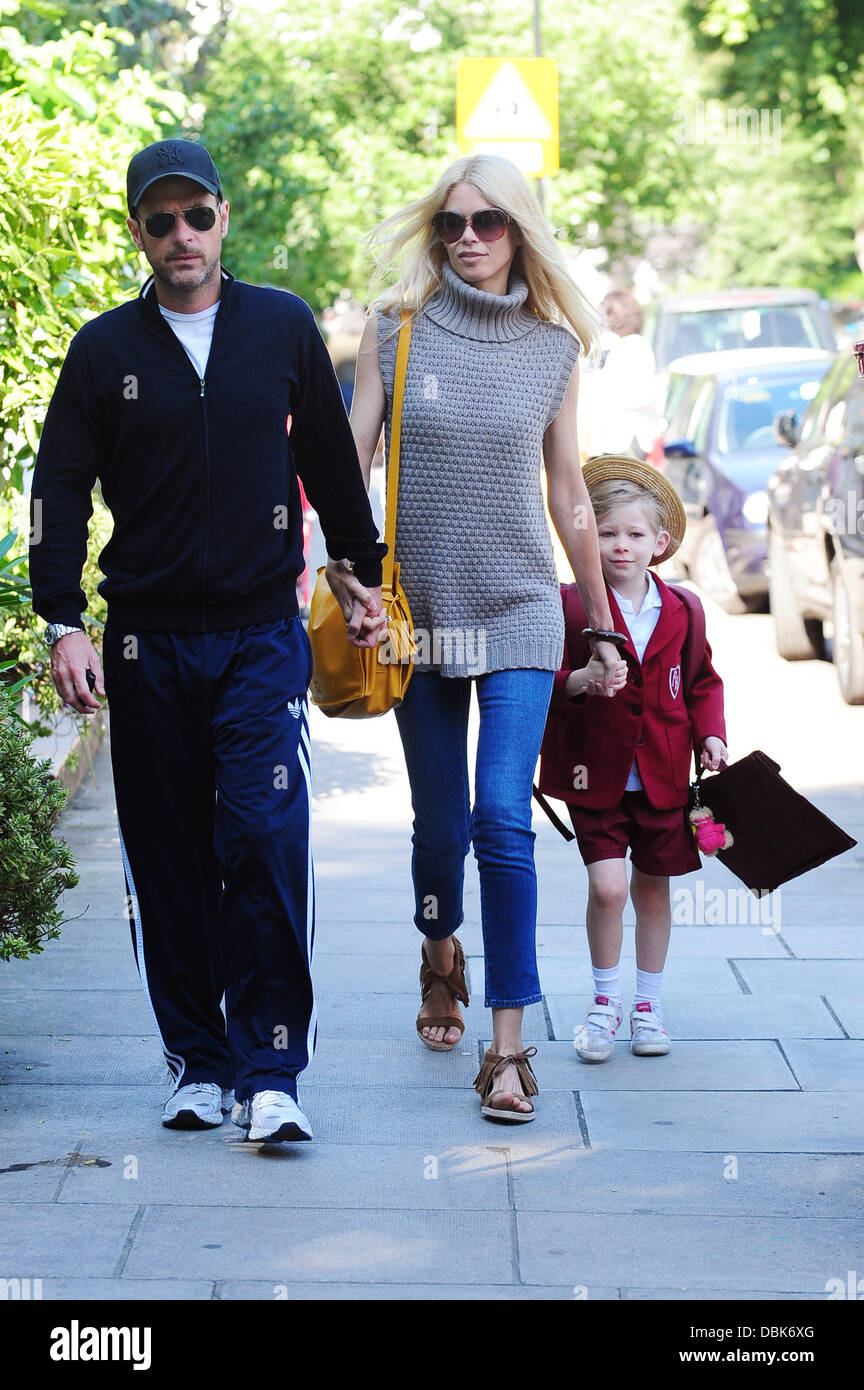 Claudia Schiffer and her husband Matthew Vaughn hold hands as they walk  their daughter Clementine to school London, England - 01.07.11 Stock Photo  - Alamy