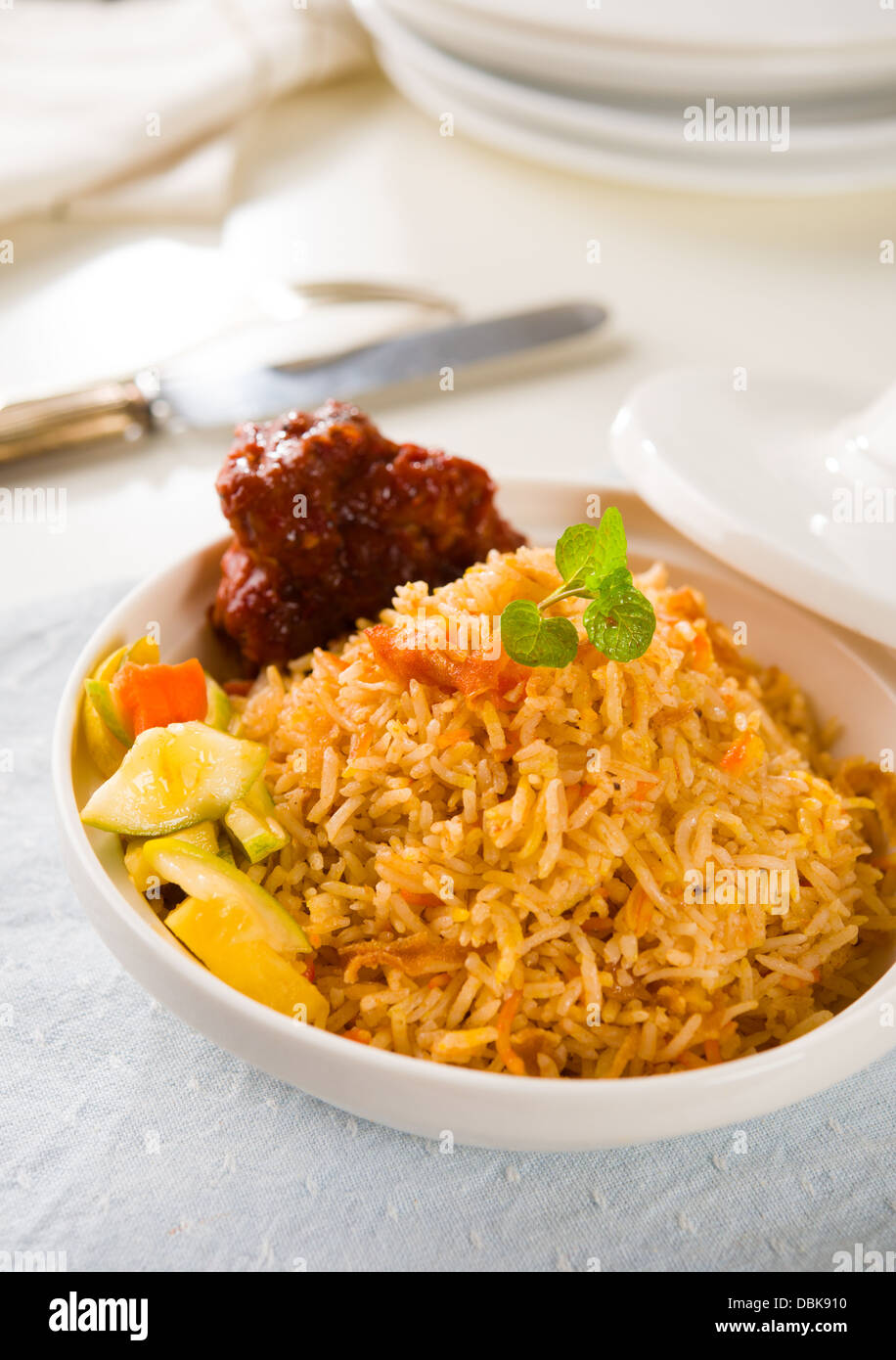 Biryani chicken rice cooked in arab style tajine with traditional india ...