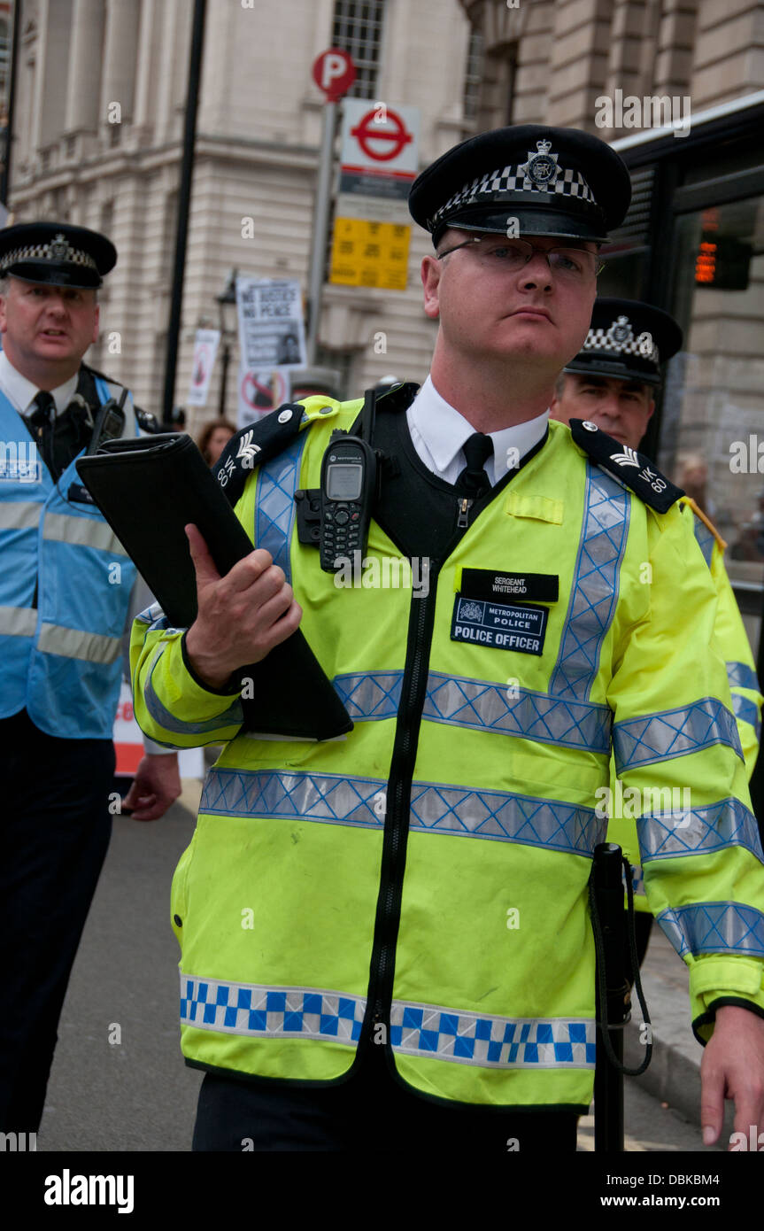 London Metropolitan Police sergeant on duty at a protest Stock Photo - Alamy