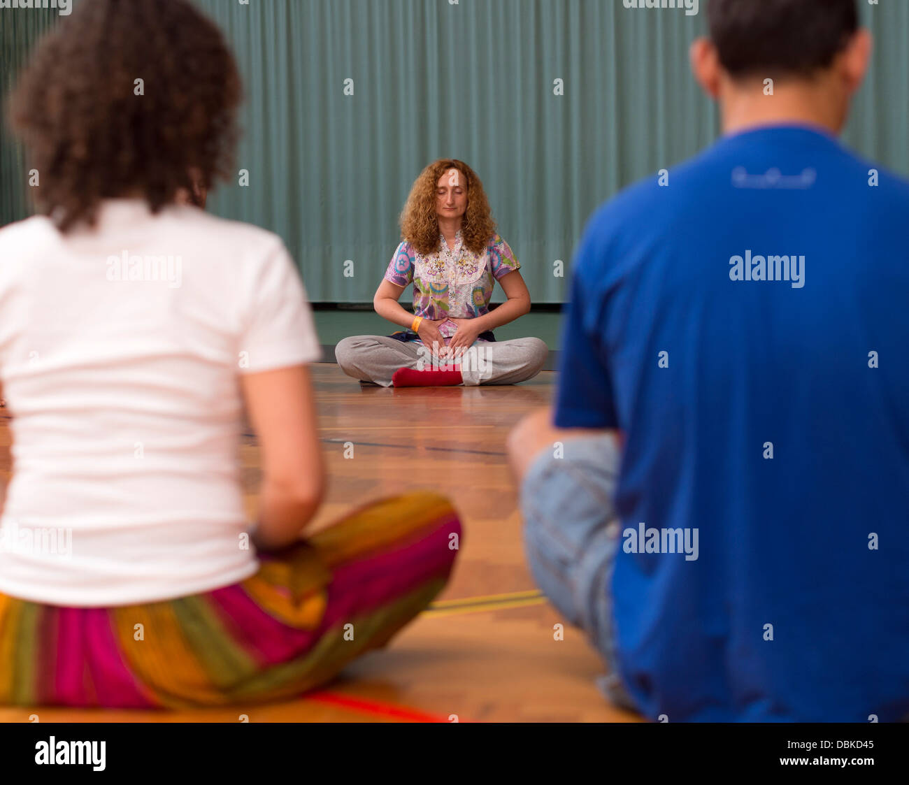 Group of people meditating Stock Photo