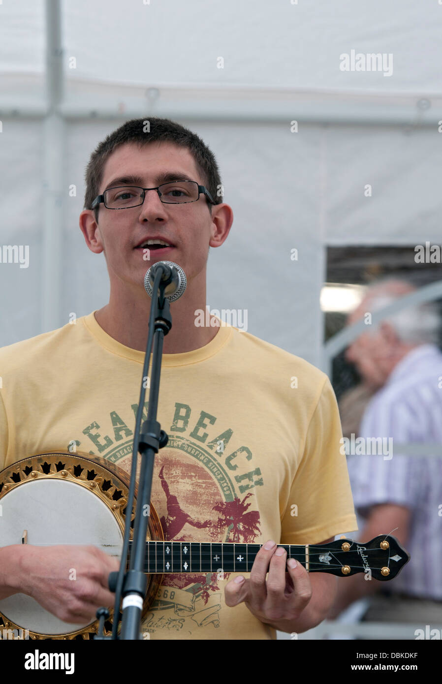 Banjo ukulele player Stock Photo Alamy