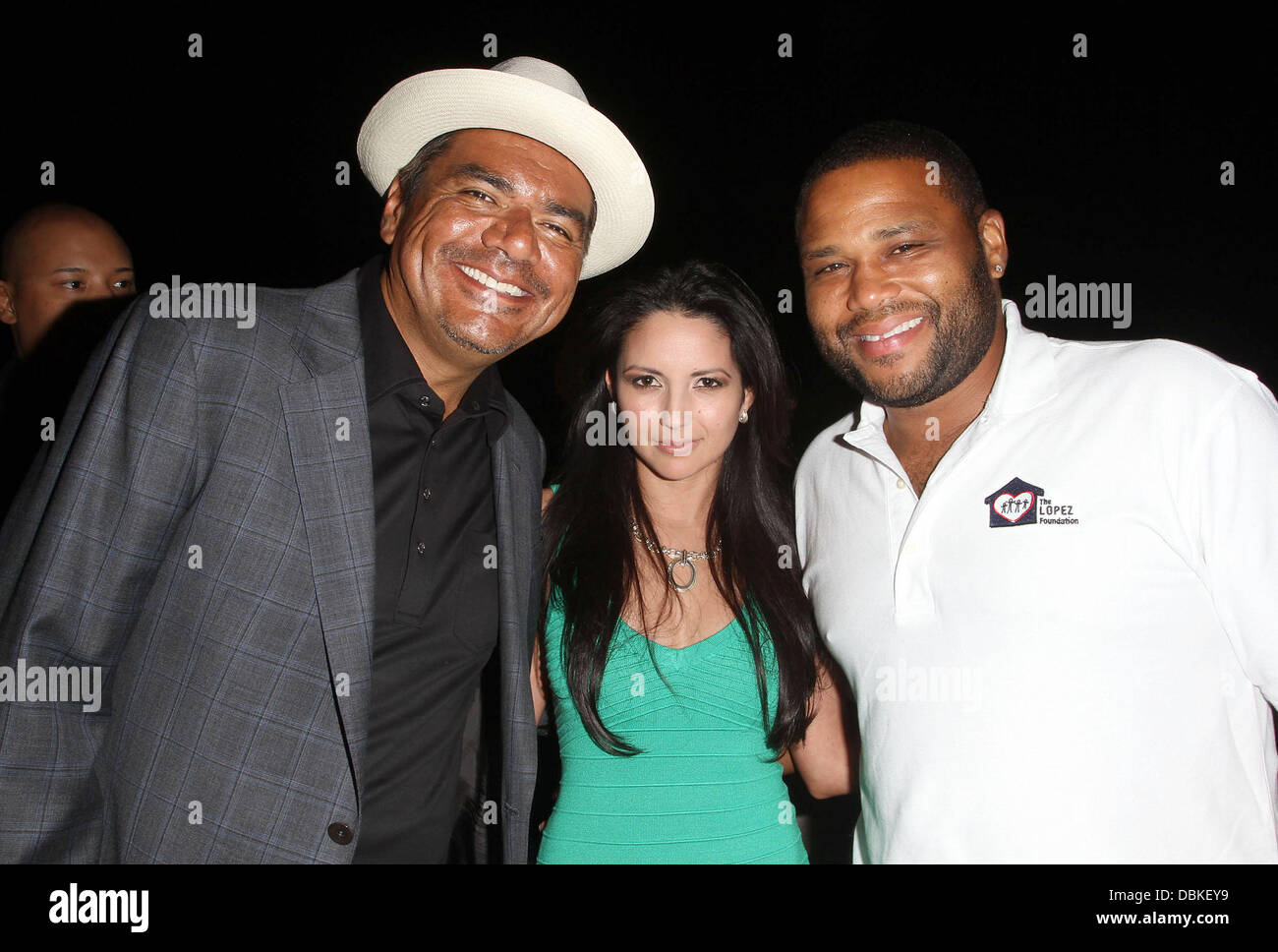 George Lopez, Cindy Vela, Anthony Anderson,  The Lopez Foundation celebrates 4th of July with fireworks and a salute to our troops held at the CBS Studios Studio City, California - 04.07.11 Stock Photo
