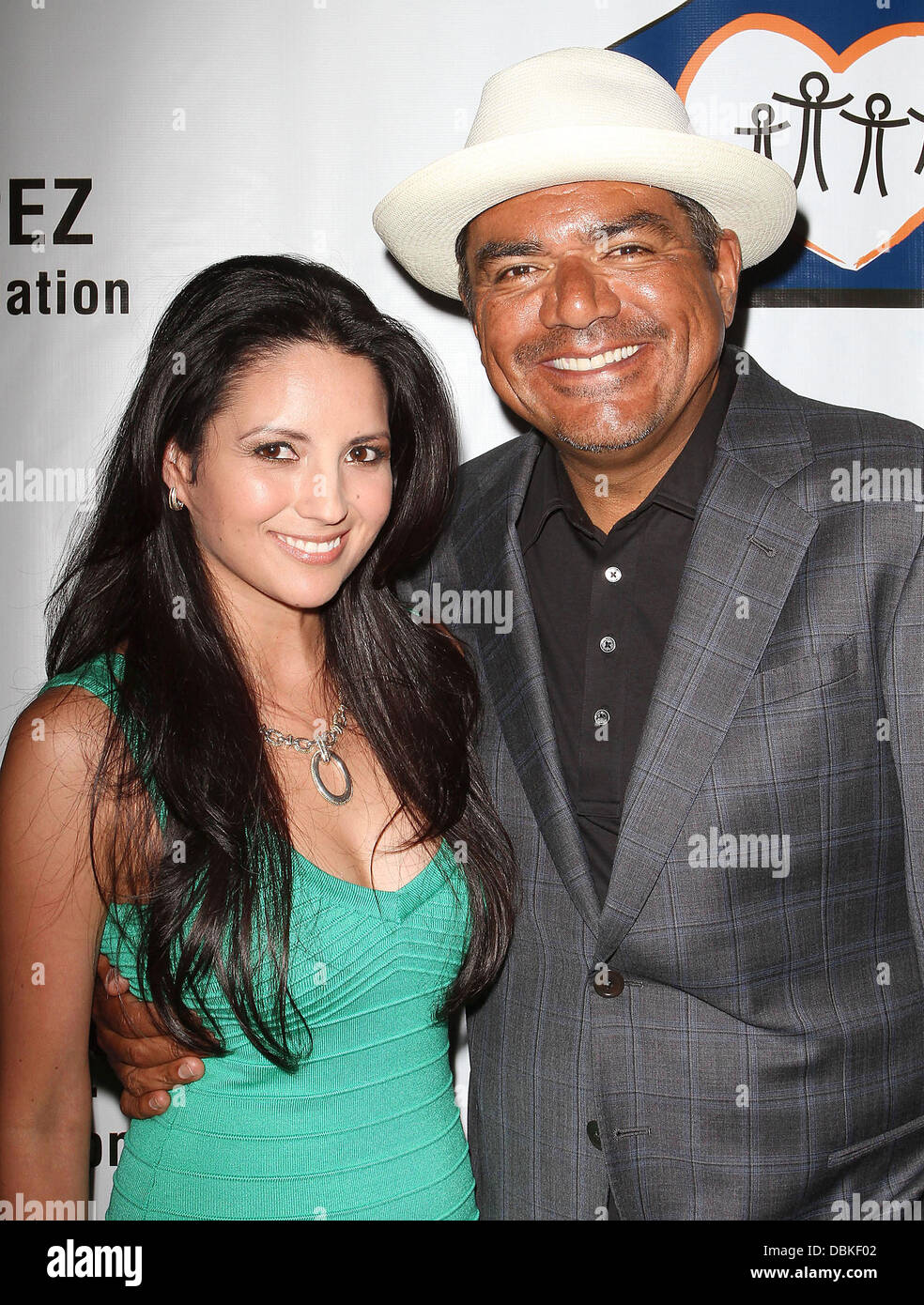 George Lopez and Cindy Vela,  The Lopez Foundation celebrates 4th of July with fireworks and a salute to our troops held at the CBS Studios Studio City, California - 04.07.11 Stock Photo