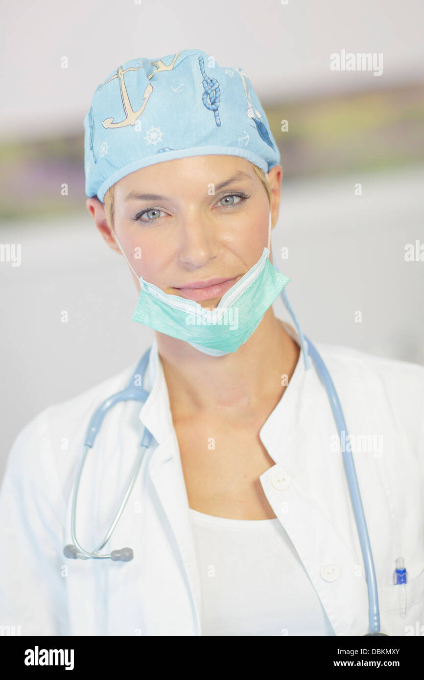 Doctor Wearing A Surgical Mask Stock Photo Alamy