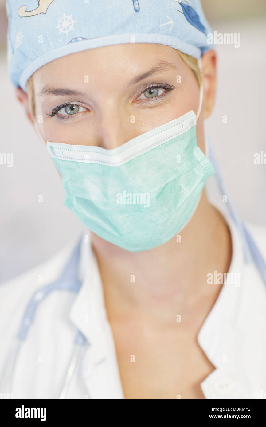 Doctor Wearing A Surgical Mask Stock Photo Alamy