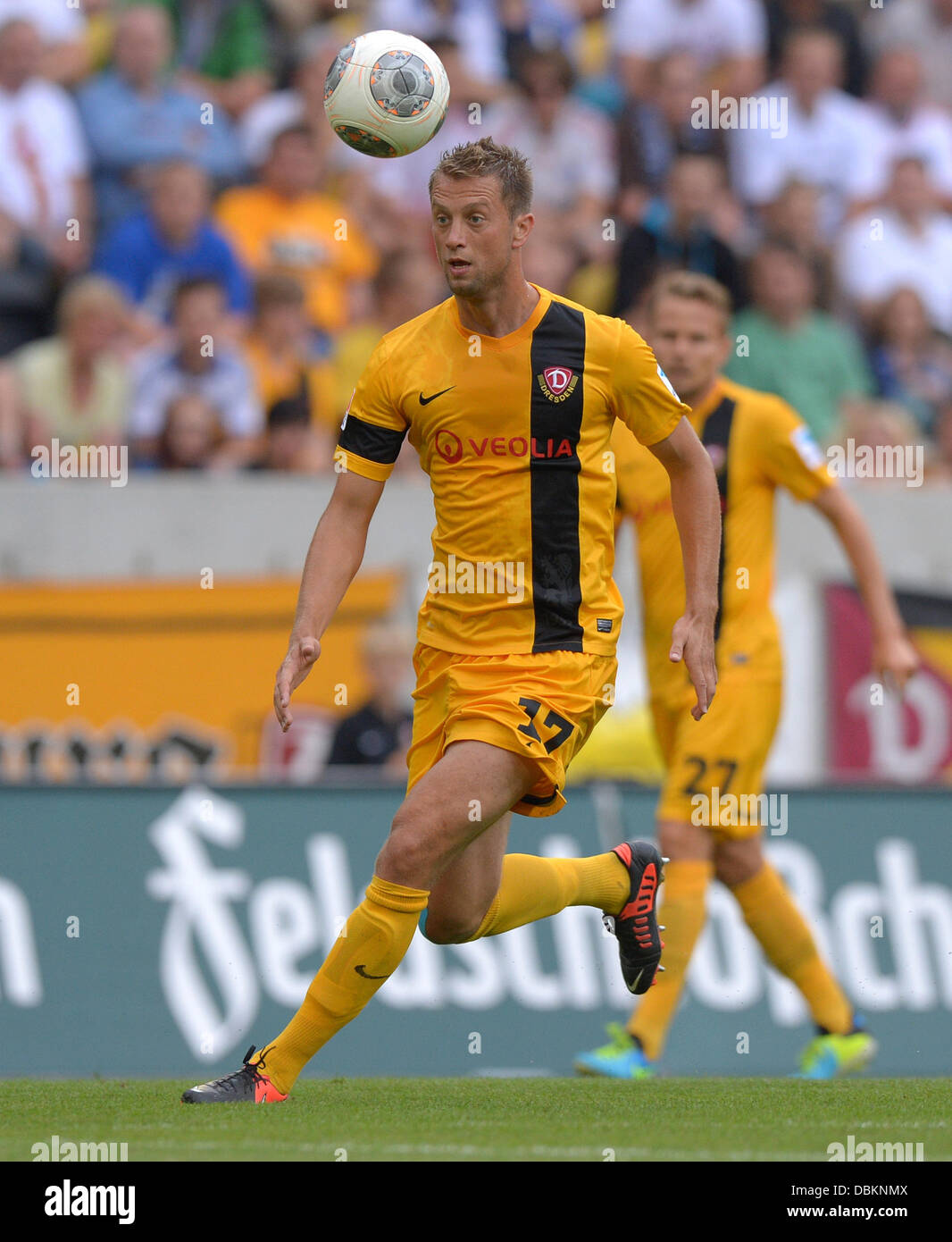 Dresden, Germany. 31st July, 2013. Dresden's Adnan Mravac during the match between SG Dynamo Dresden and Hamburger SV at gluecksgas stadium in Dresden, Germany, 31 July 2013. The revenue from the match will go to the victims of the 2013 floods. Photo: THOMAS EISENHUTH/dpa/Alamy Live News Stock Photo