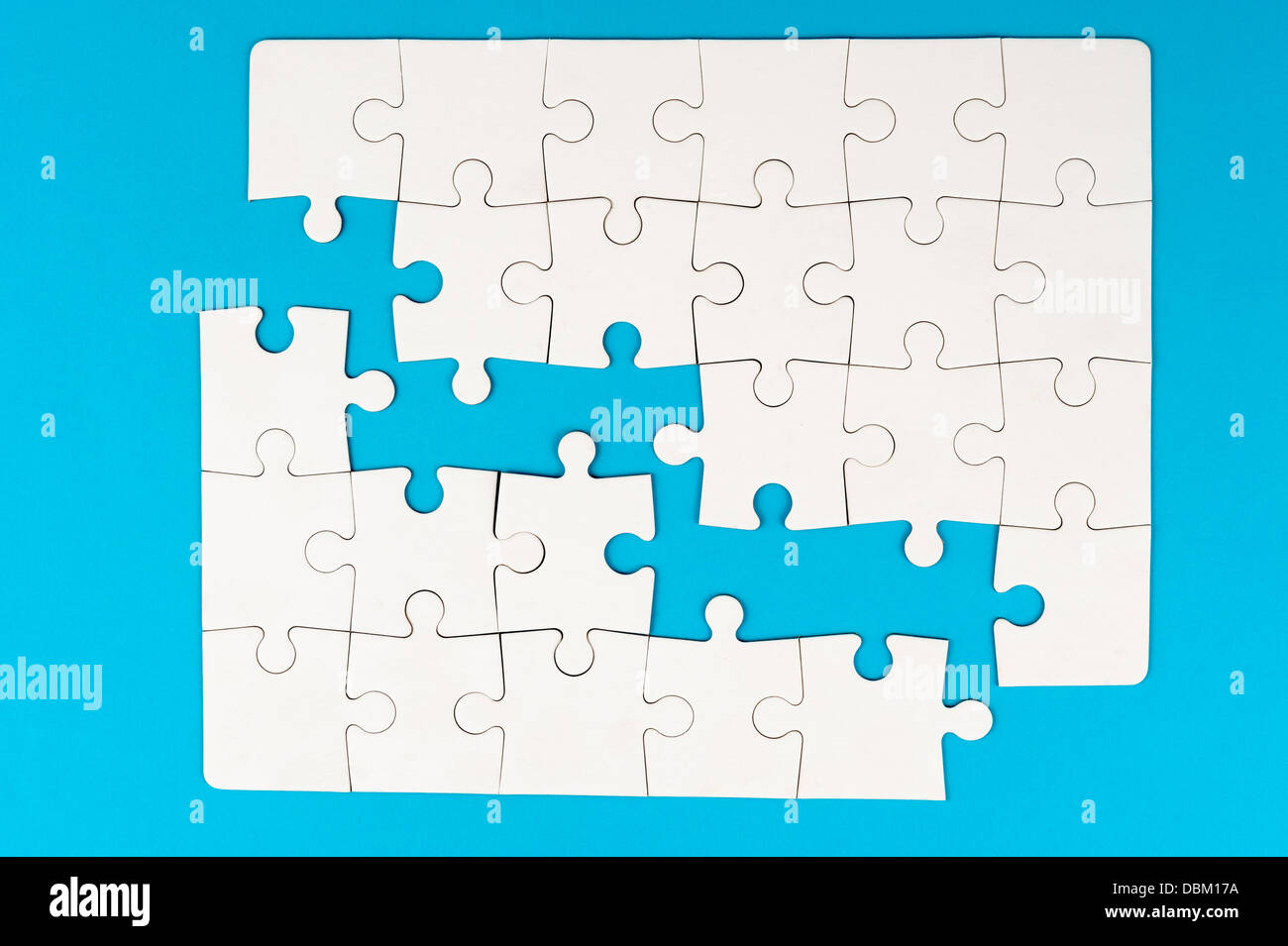 Group of white paper jigsaw puzzles Stock Photo Alamy