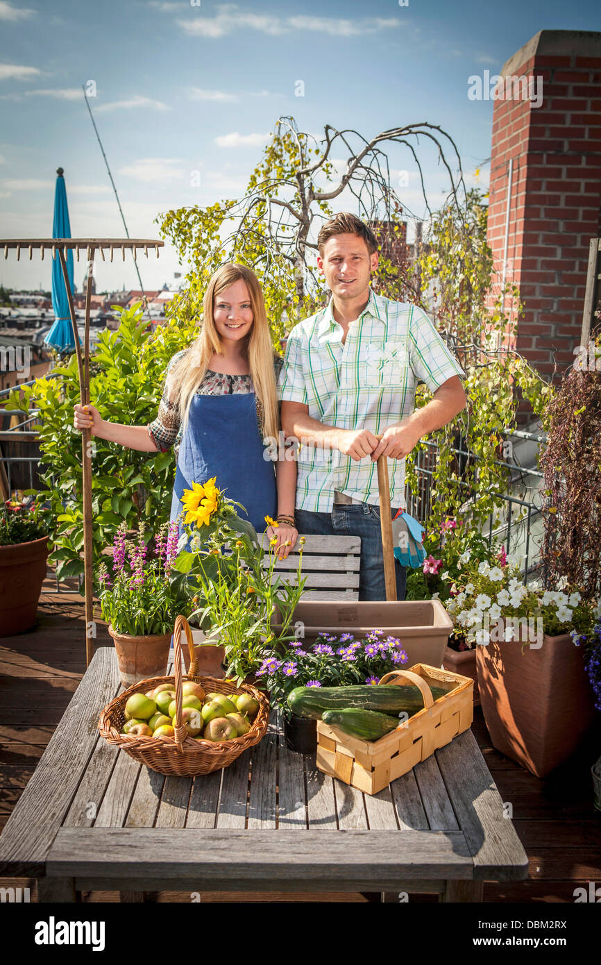 Gardening couple balcony hi-res stock photography and images - Alamy